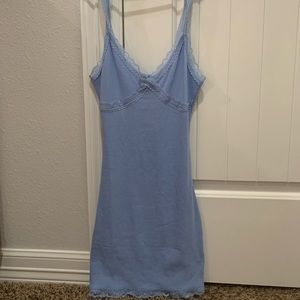 Garage mini dress with lace trim and bra cutout.